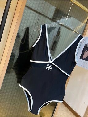 CHANEL Black Swimsuit with White Trim and Logo Tag